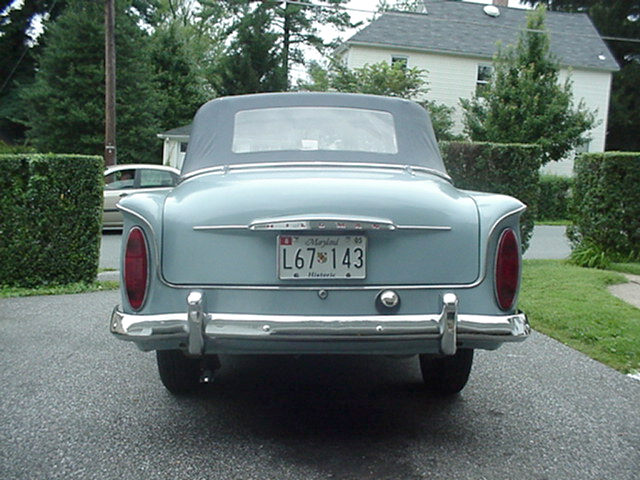 Proudly showing off a brand new gas cap repainted Hillman lettering 